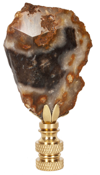 Another finial by Hillary Thomas is a sliver of petrified wood.