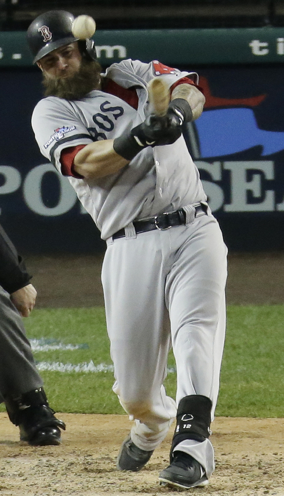 Boston Red Sox’s Mike Napoli raps a single during Game 5 of the American League Championship Series against the Detroit Tigers on Thursday. Game 6 is Saturday at 8:07 p.m.