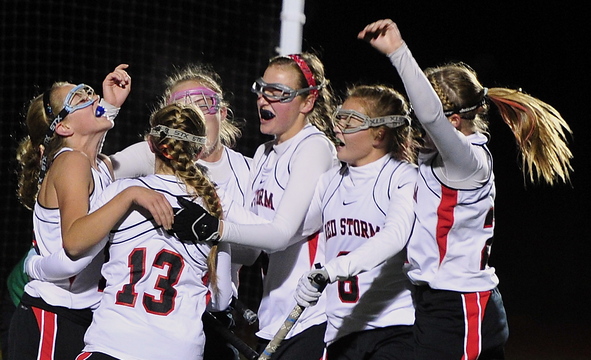 Scarborough players celebrate their second goal of the game Tuesday night on the way to a 6-3 win over Massabesic in the Western Class A field hockey final.