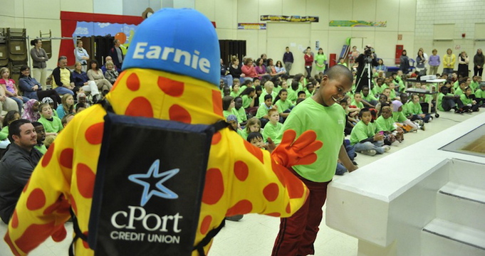 cPort Credit Union mascot’s “Earnie” participates in a Riverton Elementary School scholarship awards ceremony in May 2011. Maine credit unions got off to a strong start in 2013, posting new records for the first six months.