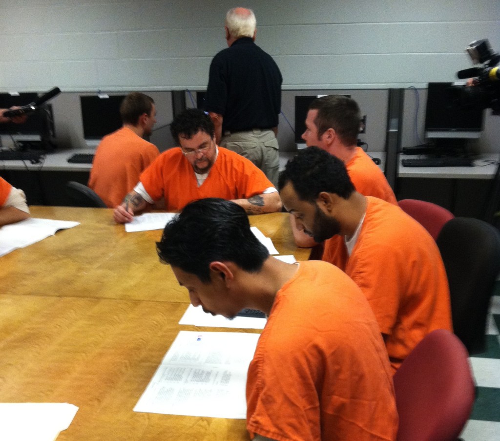 A group of Cumberland County Jail inmates takes a pre-test Wednesday to determine readiness to take a test toward earning their General Educational Development degree.