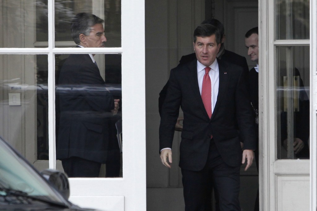 U.S Ambassador to France Charles H. Rivkin, right, leaves the Foreign Ministry in Paris, after he was summoned Monday.