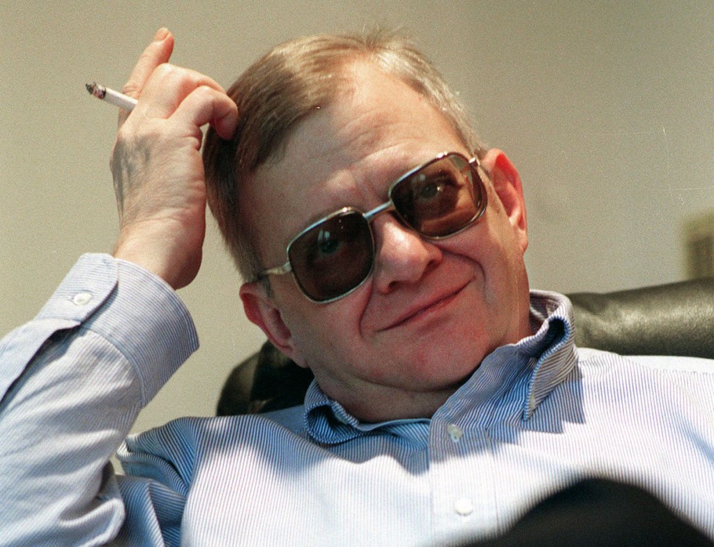 In this Feb. 4, 1998 file photo, writer Tom Clancy appears at his home in Calvert County, Md. Clancy, the estselling author of more than 25 fiction and nonfiction books for the Penguin Group, died on Oct. 1, 2013 in Baltimore, Md. He was 66. (AP Photo/Vince Lupo)