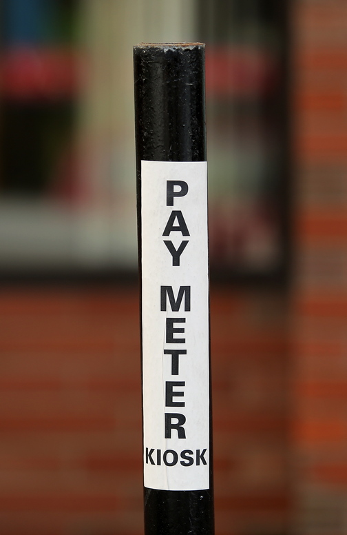 This former parking meter on Temple Street in downtown Portland tells patrons to use the city’s new parking kiosks, which are being rolled out across the city.