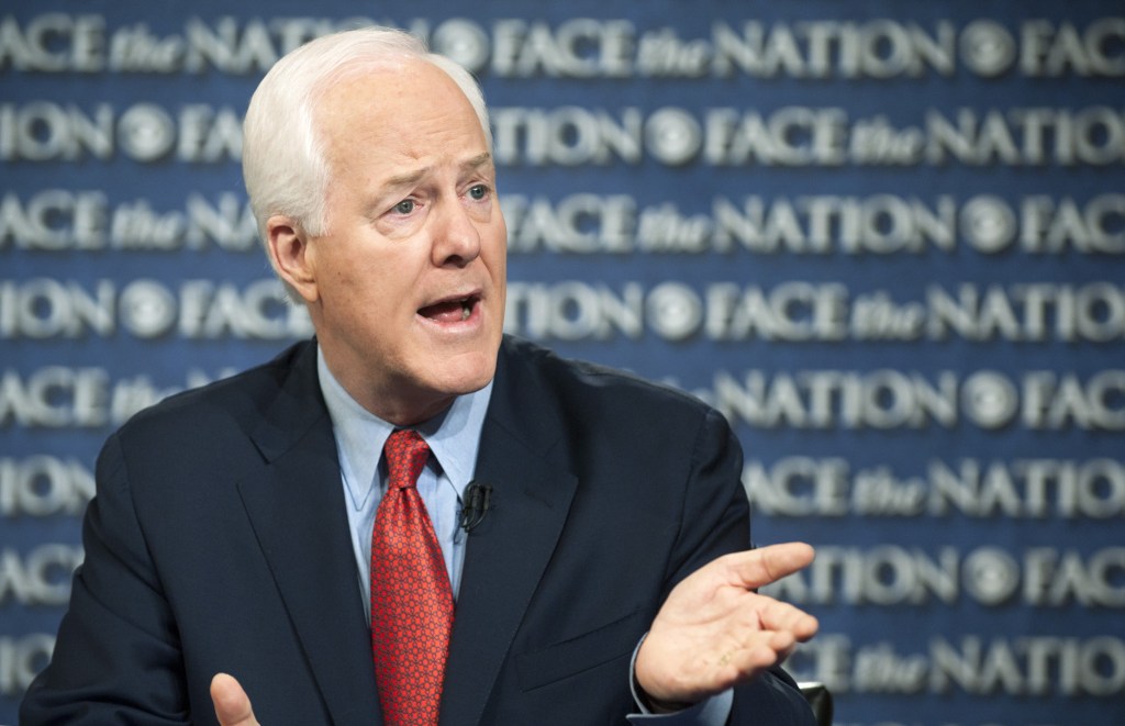 In this photo provided by CBS News, Sen. John Cornyn, R-Texas, speaks on CBS’s “Face the Nation” in Washington on Sunday. Cornyn said the partial federal government shutdown cannot end without President Barack Obama sitting down with congressional Republicans.”What he needs to do is to roll up his sleeves,” Cornyn said. “We’re not going to resolve this without the president engaging,” he said. “So far, he’s been AWOL,” he added.