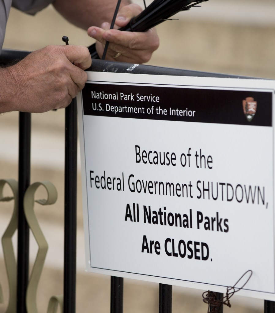 A National Park Service employee posts a sign on a barricade closing access to the Lincoln Memorial on Tuesday. Maine’s U.S. senators haven’t made constructive contributions to the dialogue over the federal shutdown, readers say.