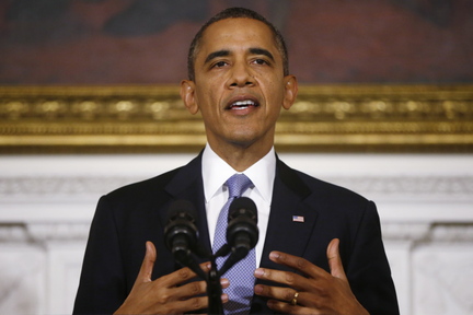 President Barack Obama speaks in the State Dining Room of the White House in Washington on Thursday.