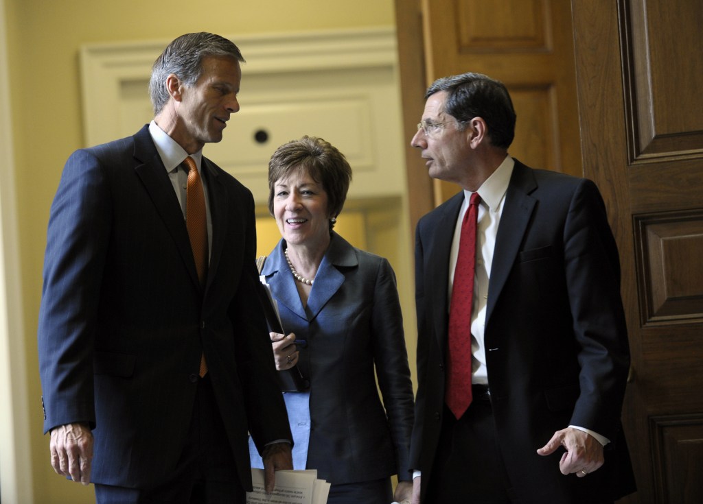 From left, Sen. John Thune, R-S.D., Sen. Susan Collins, R-Maine, and Sen. John Barrasso, R-Wyo., talk as they leave a closed-door meeting of Senate Republicans on Capitol Hill in Washington, Wednesday, Oct. 9, 2013. President Barack Obama is making plans to talk with Republican lawmakers at the White House in the coming days as pressure builds on both sides to resolve their deadlock over the federal debt limit and the partial government shutdown.