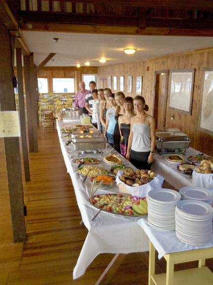 Staff members at the Linekin Bay Resort line up behind the buffet, which was expanded this year to include vegan and gluten-free items.