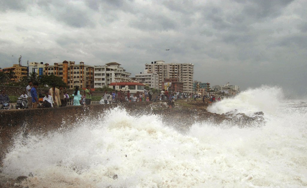 Waves pound the Bay of Bengal coast in Vishakhapatnam, India, on Saturday. Hundreds of thousands of people living along India’s eastern coastline took shelter from a massive, powerful cyclone that was headed for land packing destructive winds and heavy rains.