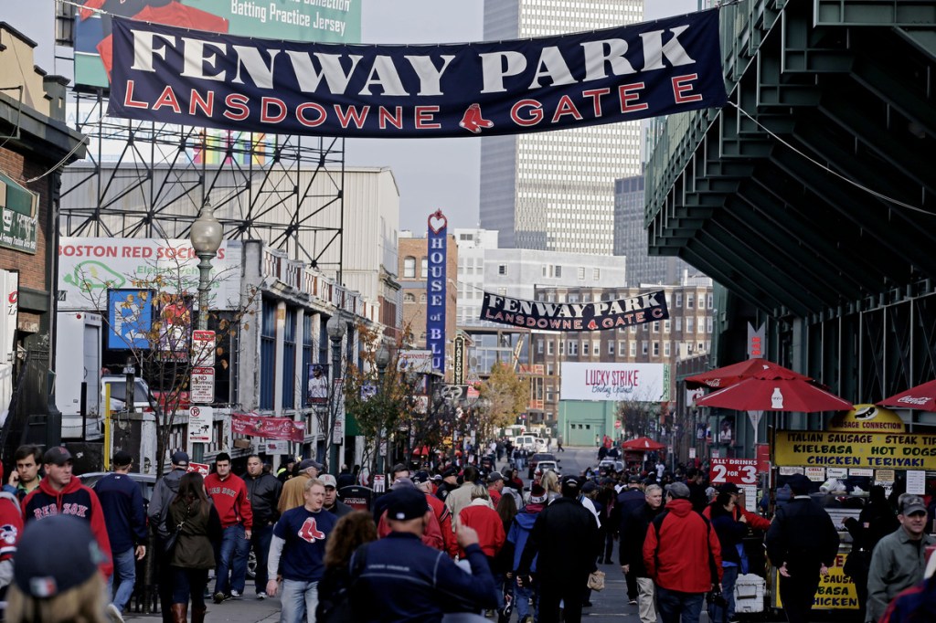 Fans make their way to Fenway Park for Game 6 of baseball’s World Series between the Boston Red Sox and the St. Louis Cardinals Wednesday, Oct. 30, 2013, in Boston.