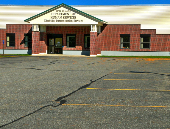 The parking lot in front of the Disability Determination Services office in Winthrop sits empty Tuesday after 52 federally funded workers were temporarily laid off and the office was closed.