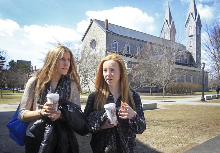 In this April 2013 file photo, freshmen Nina Hadzibabic of Long Island, CT, left, and Leah McDonough of Boston, Mass., on the Bowdoin College campus in Brunswick, Along with best food, Bowdoin College ranked 2nd for quality of life, best science facilities and best administration, in the Princeton Review’s most-recent college rankings. It also ranked 4th for best dorms and 10th for happiest students.