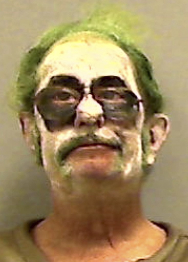 This booking photo provided by the Somerset County Sheriff’s Department shows Dennis Lalime, arrested Sunday, Oct. 20, 2013, when returning from a Halloween party made up as "The Joker," and charged with drunken driving after crashing his car in Pittsfield, Maine. (AP Photo/ Somerset County Sheriff’s Department)