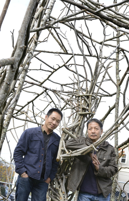 Nguyen Ngoc Lam and Dao Chau Hai, visiting sculptors from Hanoi, Vietnam, call their piece at the corner of Casco and Shepley streets in Portland “The Tree Man.”