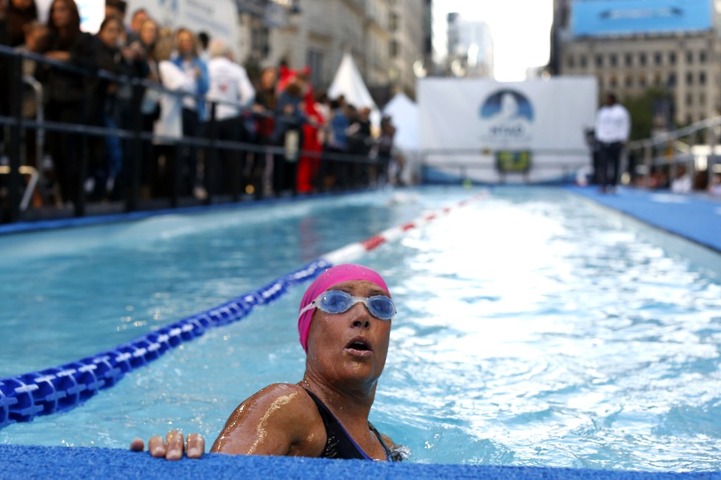 Long-distance swimmer Diana Nyad, who recently completed a record-setting swim from Cuba to Florida, completes a lap during a continuous 48-hour marathon swim event in New York’s Herald Square Tuesday called “Swim for Relief,” which aims to raise funds and awareness for Superstorm Sandy recovery efforts.
