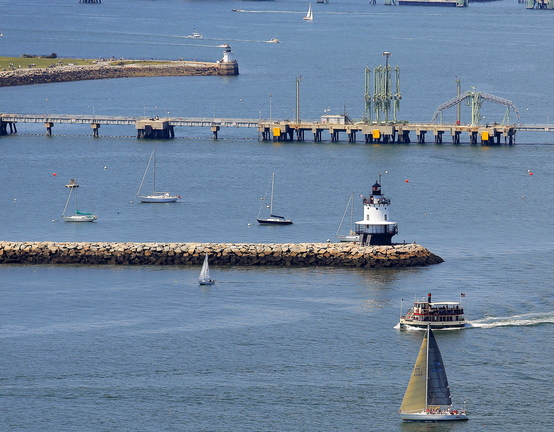 Spring Point Ledge Light, foreground, and Bug Light, rear center, stand on either side of the oil pipeline in South Portland. On Nov. 5, South Portland voters will decide whether the city should restrict new development of petroleum-related industry on its waterfront.