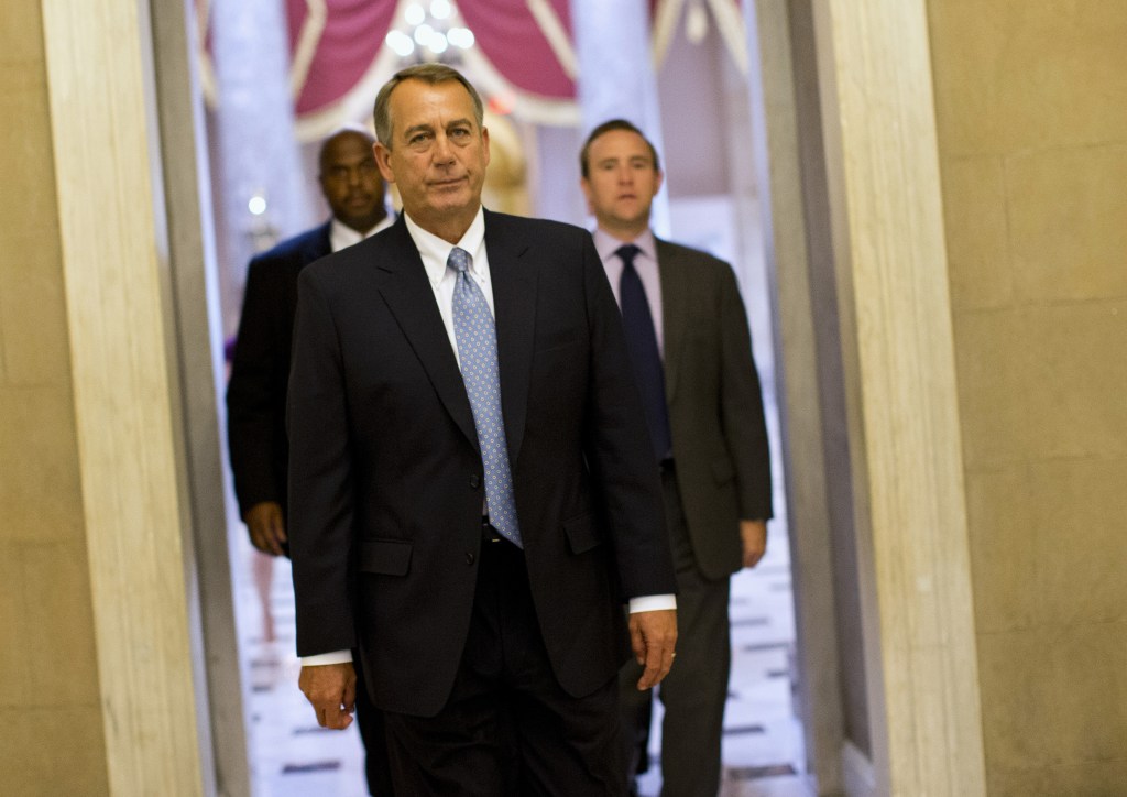 House Speaker John Boehner of Ohio walks to his office on Capitol Hill in Washington, Wednesday, Oct. 2, 2013. The Republican-run House has rejected an effort by Democrats to force a quick end to the partial government shutdown. By a 227-197 vote Wednesday, the House rejected a move by Democrats aimed at forcing the House to vote on immediately reopening the government without clamping any restrictions on President Barack Obama’s health care law.