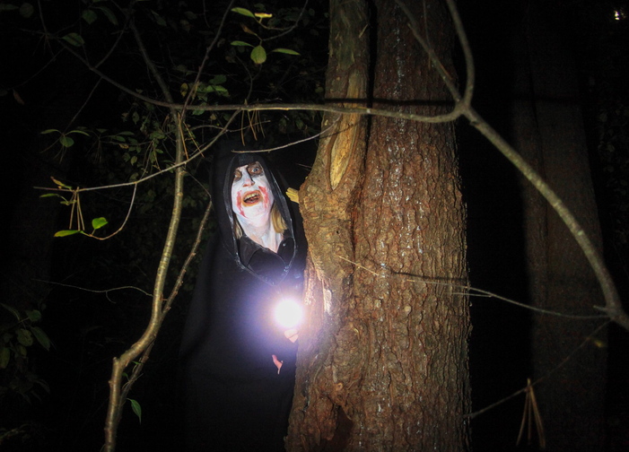 Jill Brady/Staff Photographer A ghoulish zombie lurks in the woods along Steve Workman's "Night Terror" haunted walk at Take Flight Ariel Adventures in Kittery Sunday, October 13, 2013.