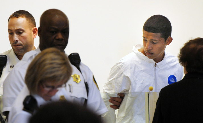 Philip Chism, 14, stands during his arraignment for the death of Danvers High School teacher Colleen Ritzer in Salem District Court in Salem, Mass., Wednesday, Oct. 23, 2013. Chism has been ordered held without bail.