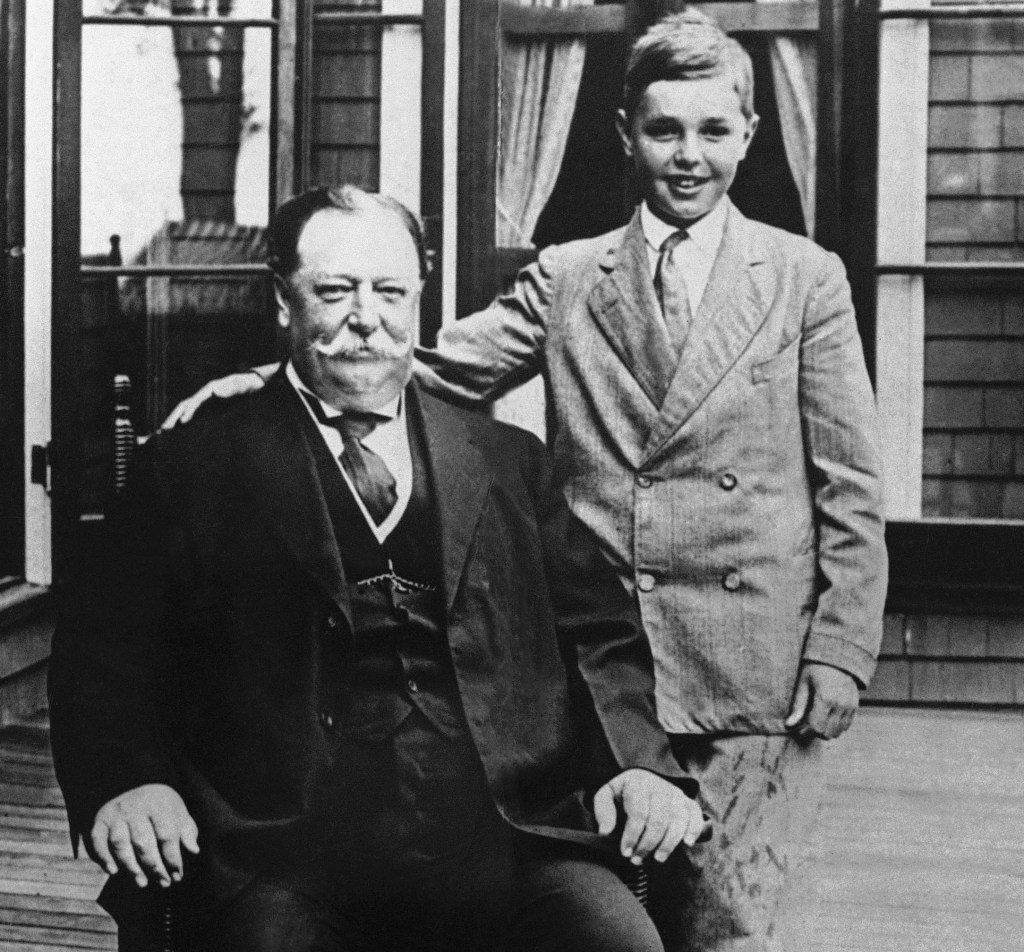 President William Howard Taft poses for a photo with his son Charles while on vacation in Beverly, Mass. Taft’s weight, at times well over 300 pounds, made headlines.