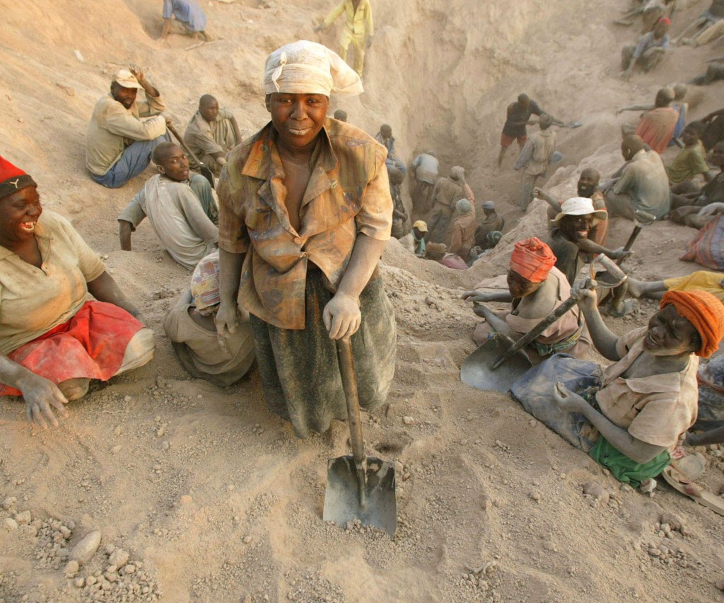 Gangs of illegal miners dig for diamonds in Marange, eastern Zimbabwe, in November 2006. The lucrative diamond field was exposed by an earth tremor earlier that year.