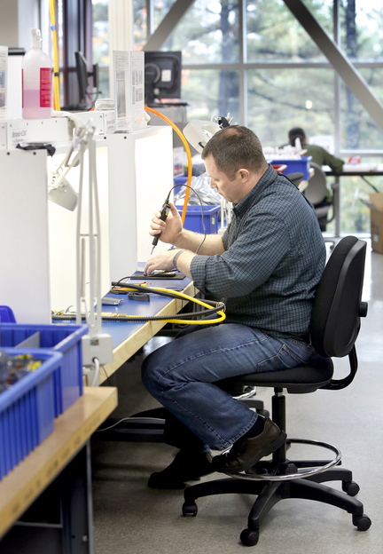 Jon McPherson assembles an inReach SE in the manufacturing center at DeLorme in Yarmouth.