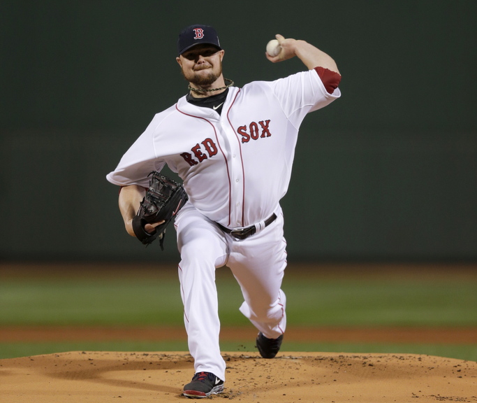 Boston Red Sox starting pitcher Jon Lester throws during the first inning of Game 1 of baseball’s World Series against the St. Louis Cardinals on Oct. 23 in Boston. He pitched 7- shutout innings, allowing five hits and one walk. He struck out eight.