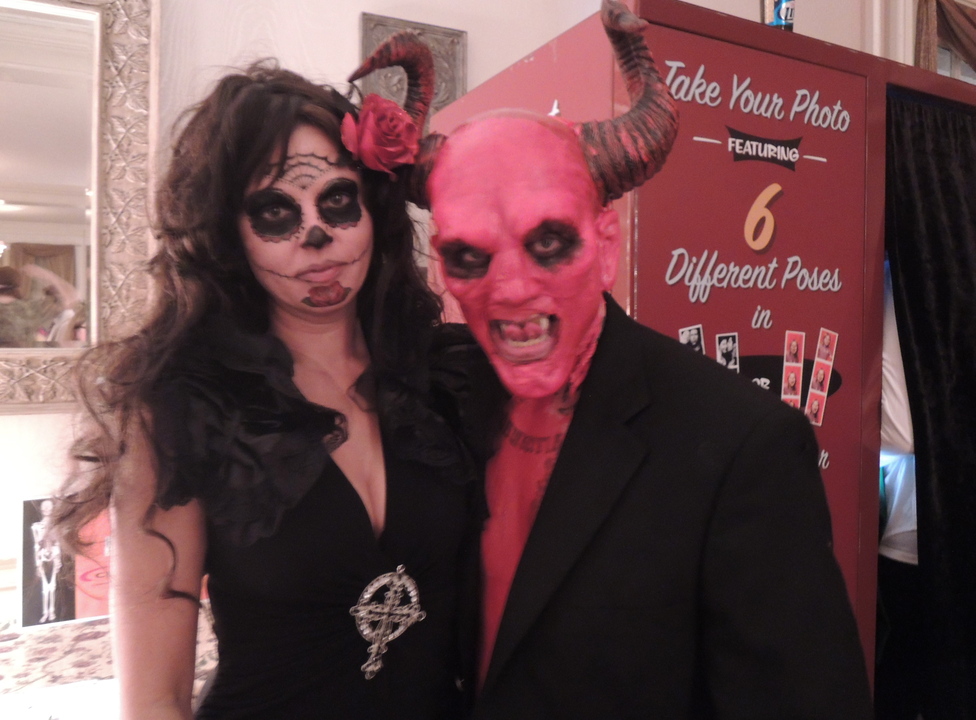 Portland residents Erica Ouellet in Day of the Dead garb, with devil John Aday, in the grand prize-winning costume.