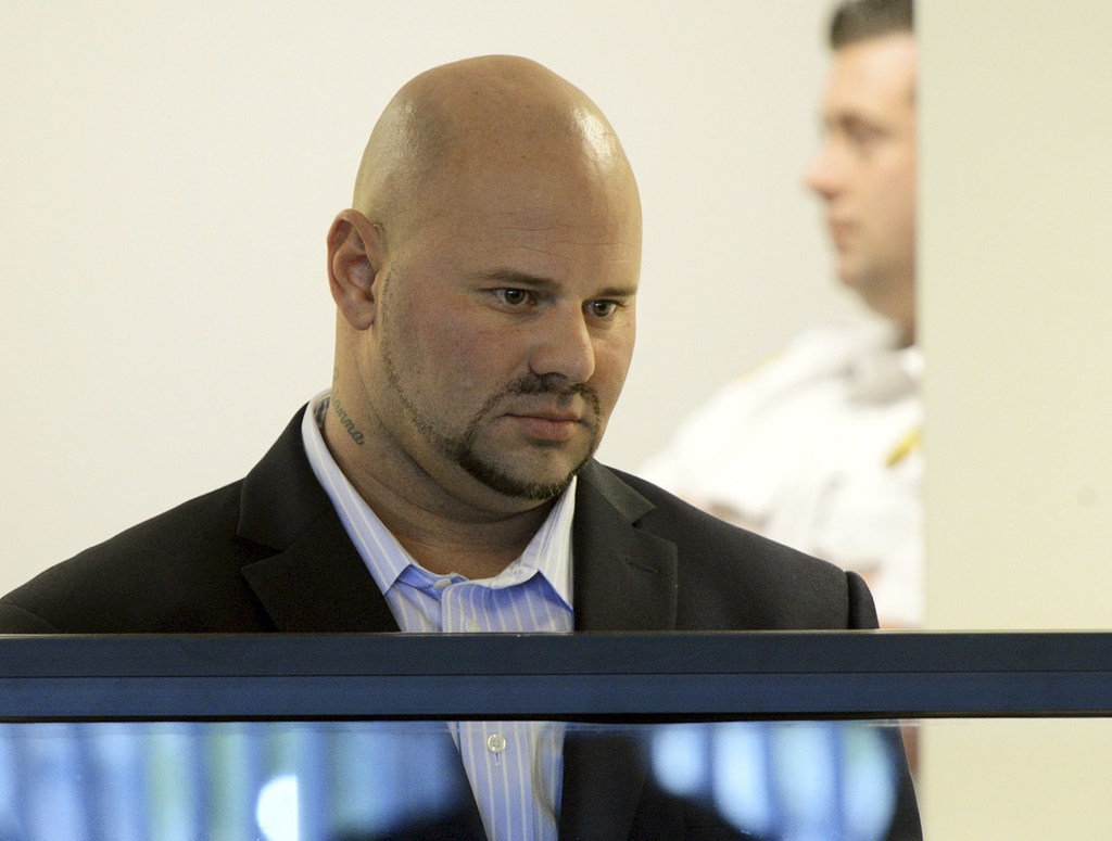 Jared Remy, son of Boston Red Sox broadcaster Jerry Remy, appears at his arraignment on Oct. 8, 2013, at Middlesex Superior Court in Woburn, Mass., on murder and assault charges in the death of his girlfriend Jennifer Martel.