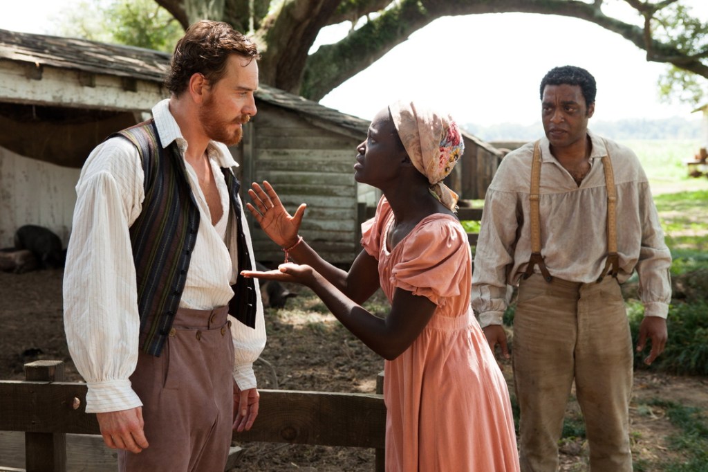 Michael Fassbender, left, with Lupita Nyong’o and Chiwetel Ejiofor in “12 Years a Slave.”