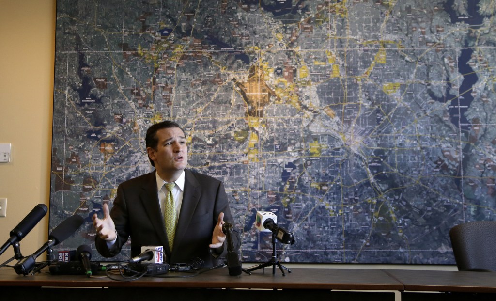 Sen. Ted Cruz, R-Texas, responds to questions from reporters at the Fort Worth, Texas, Chamber of Commerce office after he participated in a small-business roundtable meeting with area business representatives Tuesday.