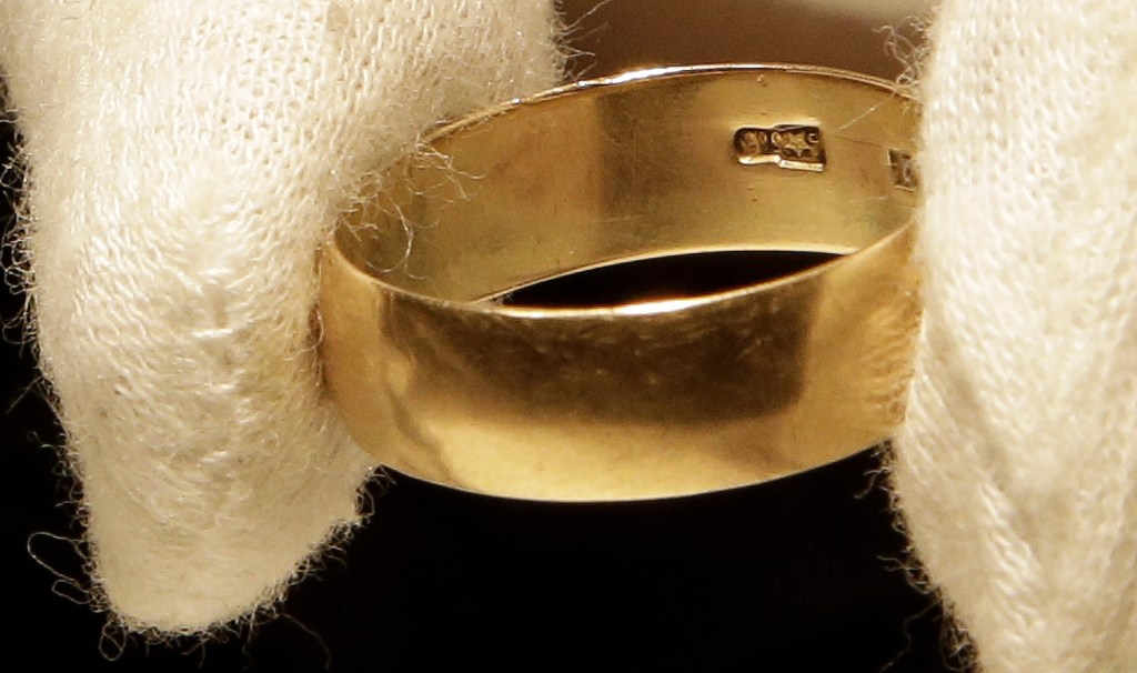 Lee Harvey Oswald’s wedding ring, which he left at his wife Marina Oswald's bedside the morning of the assassination of President John F. Kennedy, was part of a themed JFK memorabilia auction “Camelot: Fifty Years After Dallas” at the Omni Parker House hotel in Boston. Engraved on the inside of the ring is a Star of Russia.