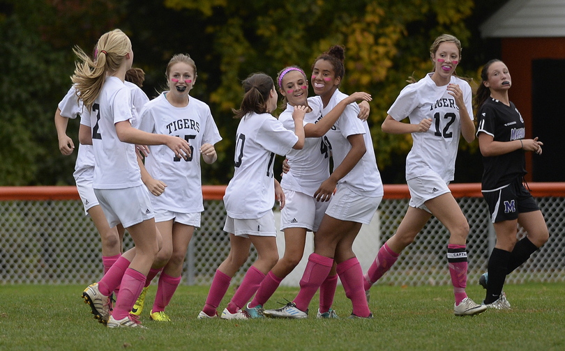 Biddeford celebrates after Lexi Paquette scored one of the two first-half goals for Biddeford against Marshwood.