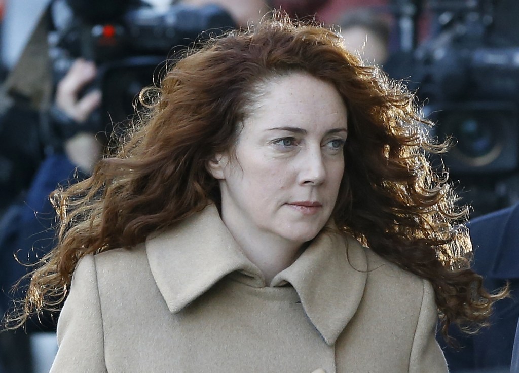 The Associated Press Rebekah Brooks arrives at The Old Bailey law court in London Monday. The former News of the World national newspaper editor and her colleague, Andy Coulson, are on trial on charges of hacking phones and bribing officials while at the now closed tabloid paper.