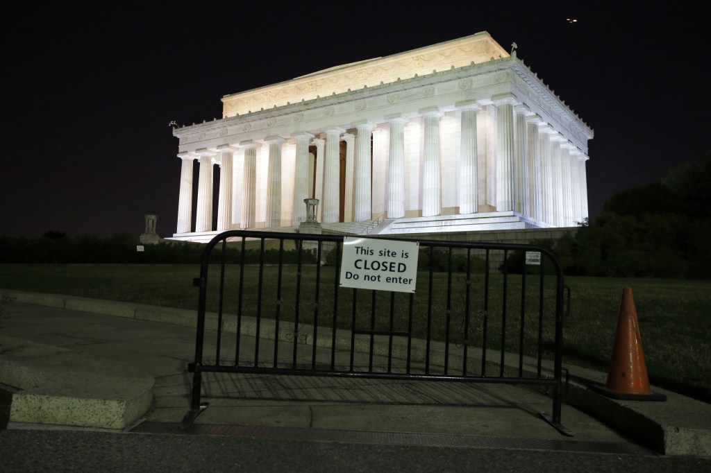 The Lincoln Memorial, and most of the federal government, is closed Tuesday, Oct. 1, 2013, in Washington. The museums that draw millions of visitors to the National Mall closed their doors Tuesday, memorials were barricaded and trash will go uncollected in the nation’s most-visited national park due to the first government shutdown in 17 years.