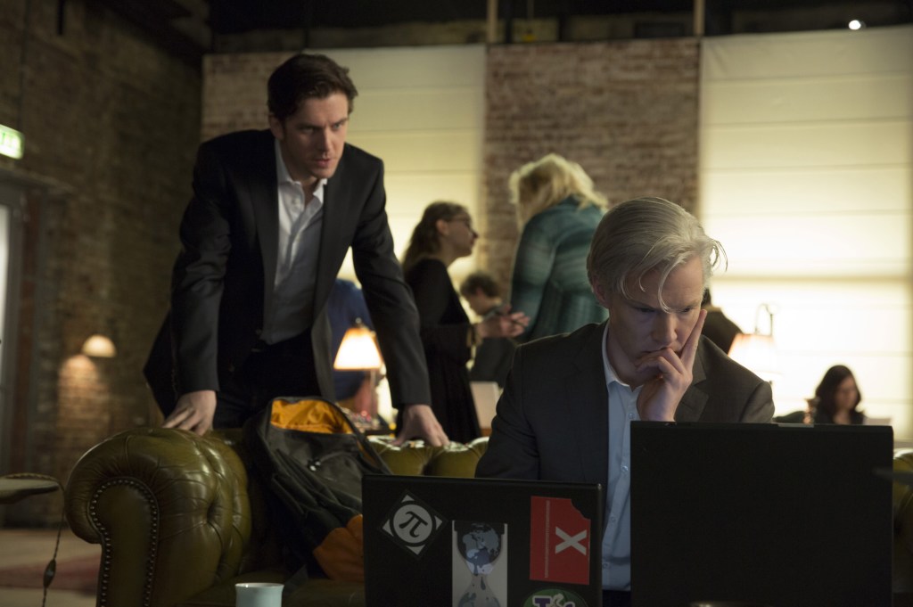 Dan Stevens as journalist Ian Katz, left, and Benedict Cumberbatch as WikiLeaks founder Julian Assange in a scene from “The Fifth Estate.”