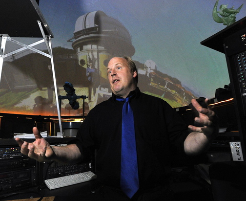 Edward Gleason, manager of the Southworth Planetarium at USM, talks last month about the proposal to eliminate the physics major at USM and its effect on the planetarium.