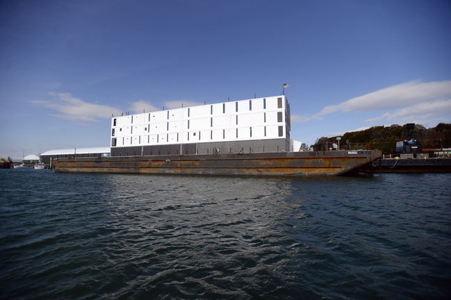 The barge holding a four-story structure made of shipping containers sits Monday in Portland Harbor. There are signs it may be a floating data center for Internet giant Google.