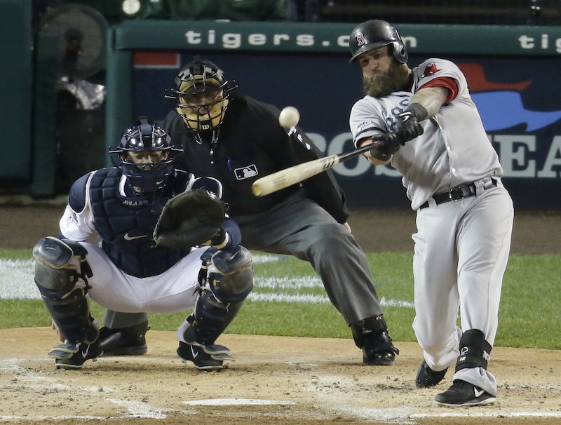 Boston Red Sox's Mike Napoli hits a home run in the second inning during Game 5 of the American League baseball championship series against the Detroit Tigers, Thursday, Oct. 17, 2013, in Detroit.