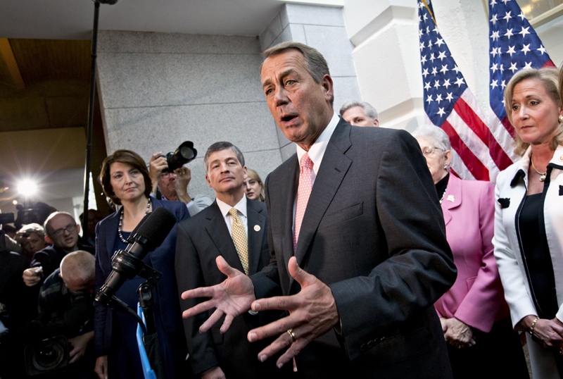 House Speaker John Boehner of Ohio, joined by fellow Republicans, speaks during a news conference on Capitol Hill in Washington, Thursday, Oct. 10, 2013, following a closed-door GOP meeting. he budget confrontation that led to a partial government shutdown dealt a major blow to the GOP's image and has exposed significant divisions between tea party conservatives and other Republicans, according to a new Washington Post-ABC News poll.