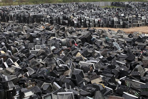 Discarded television sets pile up in a scrap yard awaiting recycling in Zhuzhou city in south China's Hunan province.