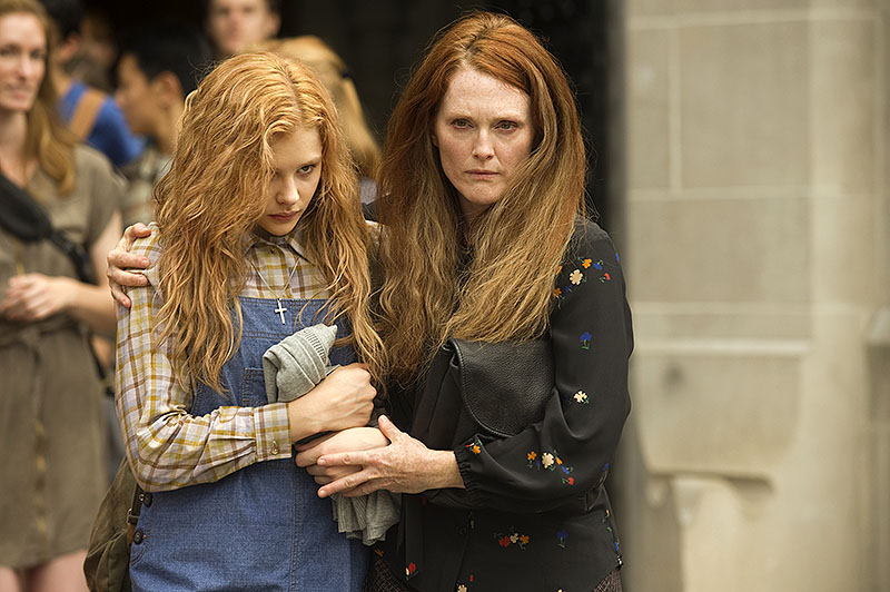 Chloe Moretz, left, and Julianne Moore in “Carrie,” a remake of the 1976 horror film based on the Stephen King novel. MGM Approved