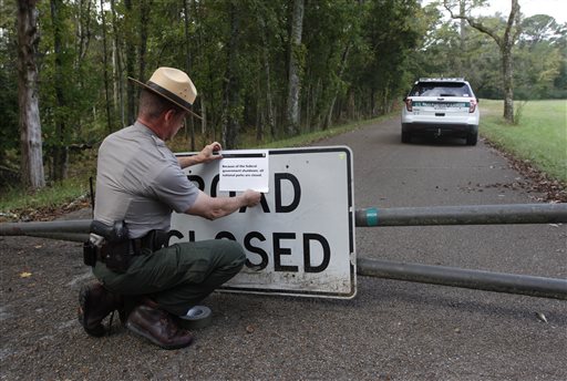 National Park Ranger Robert Turan closes a road Tuesday leading to Wilder Monument at the Chickamauga Battlefield in Chickamauga, Ga., which is among more than 400 parks across the country that have been closed as a result of the federal government's partial shutdown.