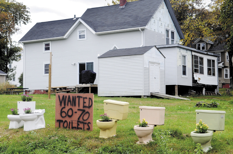 David Labbe is asking for 60 to 70 toilets, in addition to the five already there, to be dropped off on his lawn on Davenport Street in Augusta to protest the City of Augusta's decision to deny a zoning change that would have permitted Dunkin' Donuts to build a store on his property.