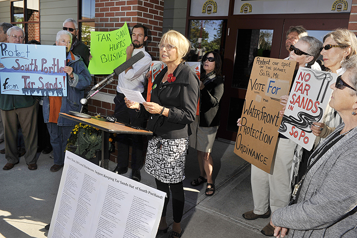 In this Sept. 18, 2013 file photo,Protect South Portland, a group opposing the exporting of tar sands out of Casco Bay, held a press conference to list 216 local businesses supporting their efforts. Deb Hutson, a realtor with Keller-Williams Real Estate, speaks at the press conference.