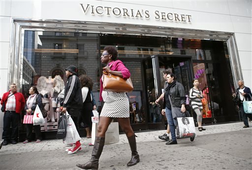 Pedestrians pass by the Victoria's Secret Herald Square store in midtown Manhattan, Thursday, Oct. 17. A security guard on the lookout for shoplifters searched two teenage girls as they left the lingerie shop Thursday afternoon, and discovered one of them was carrying what appeared to be a fetus in her bag, police said. (AP Photo/Kathy Willens)