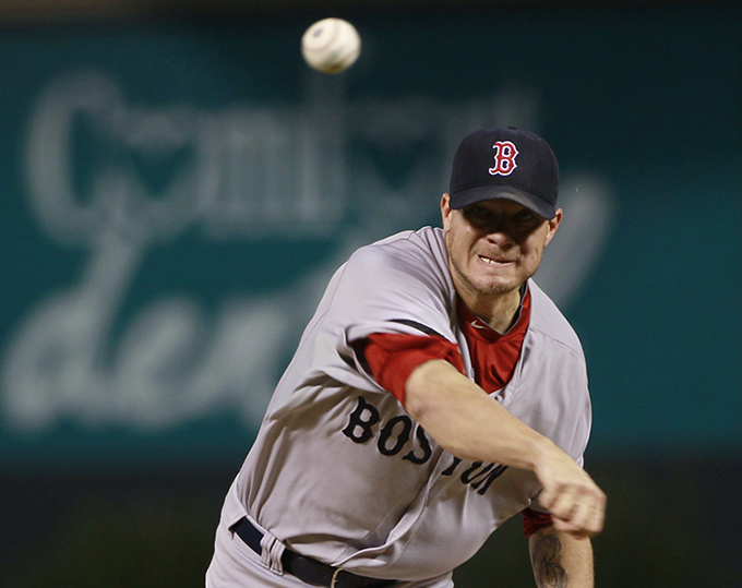 Boston Red Sox starting pitcher Jake Peavy works against the Colorado Rockies in a Sept. 25 game in Denver.
