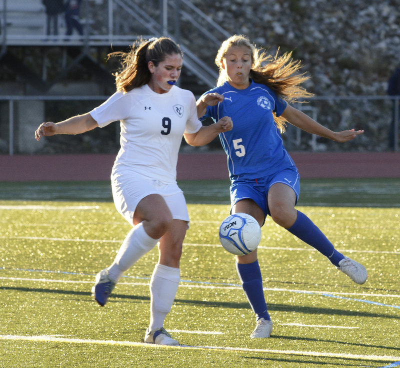 Yarmouth’s Abby Belisle-Haley, left, and Falmouth’s Georgia Babikian battle for the ball in Monday’s Western Maine Conference girls’ soccer game. Falmouth won 3-1 at Yarmouth.