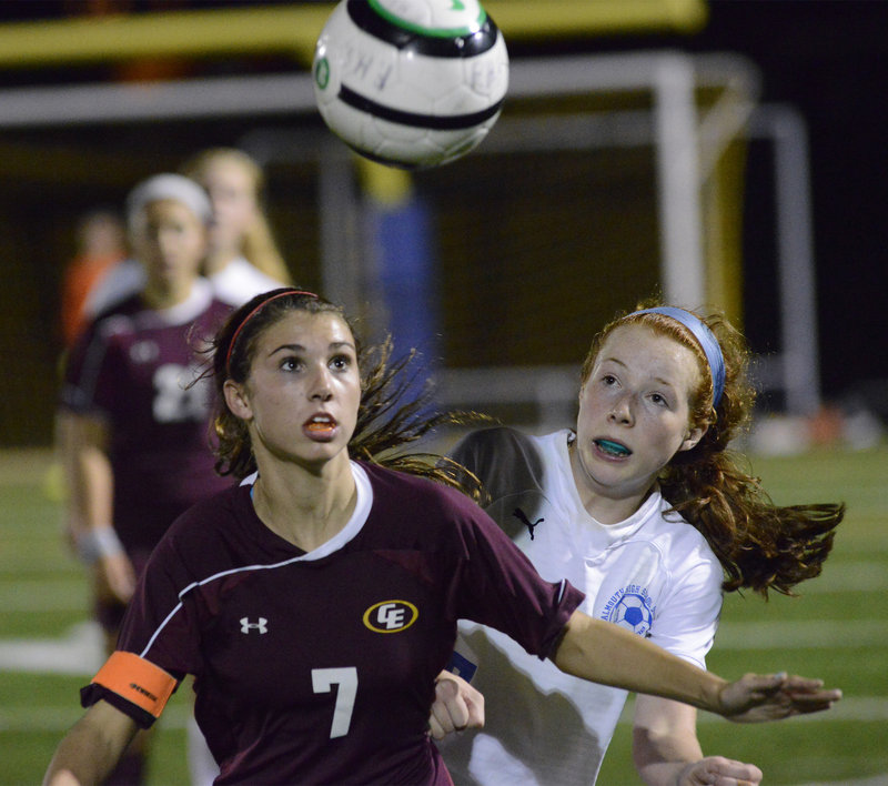 Kathryn Clark of Cape Elizabeth attempts to hold off Emma England of Falmouth and keep the inside track for the ball Wednesday night in the Capers’ 2-1 victory in a game between two of the best teams in Western Maine schoolgirl soccer.
